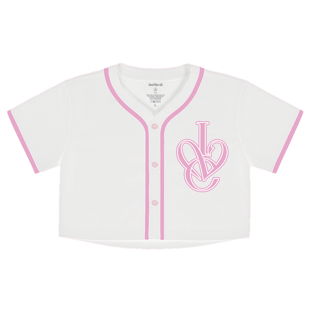 A white short-sleeve baseball-style crop top with pink trim, pink buttons, and a pink interlocking 'IVE' logo on the chest.
