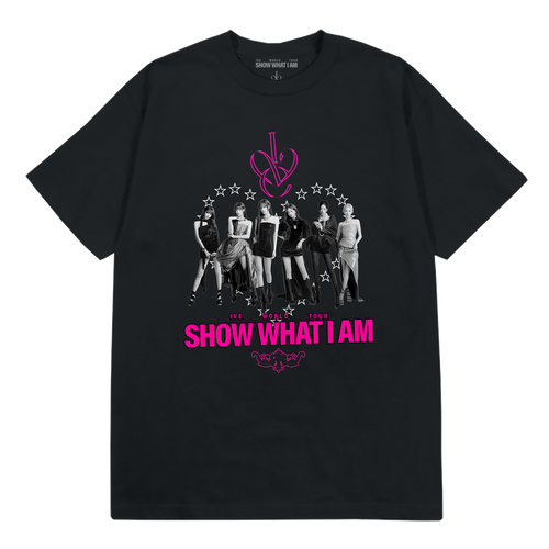 A black short-sleeve graphic t-shirt featuring a monochrome group photo of the K-pop group IVE, with a pink monogram logo above and the text 'SHOW WHAT I AM' in pink below.
