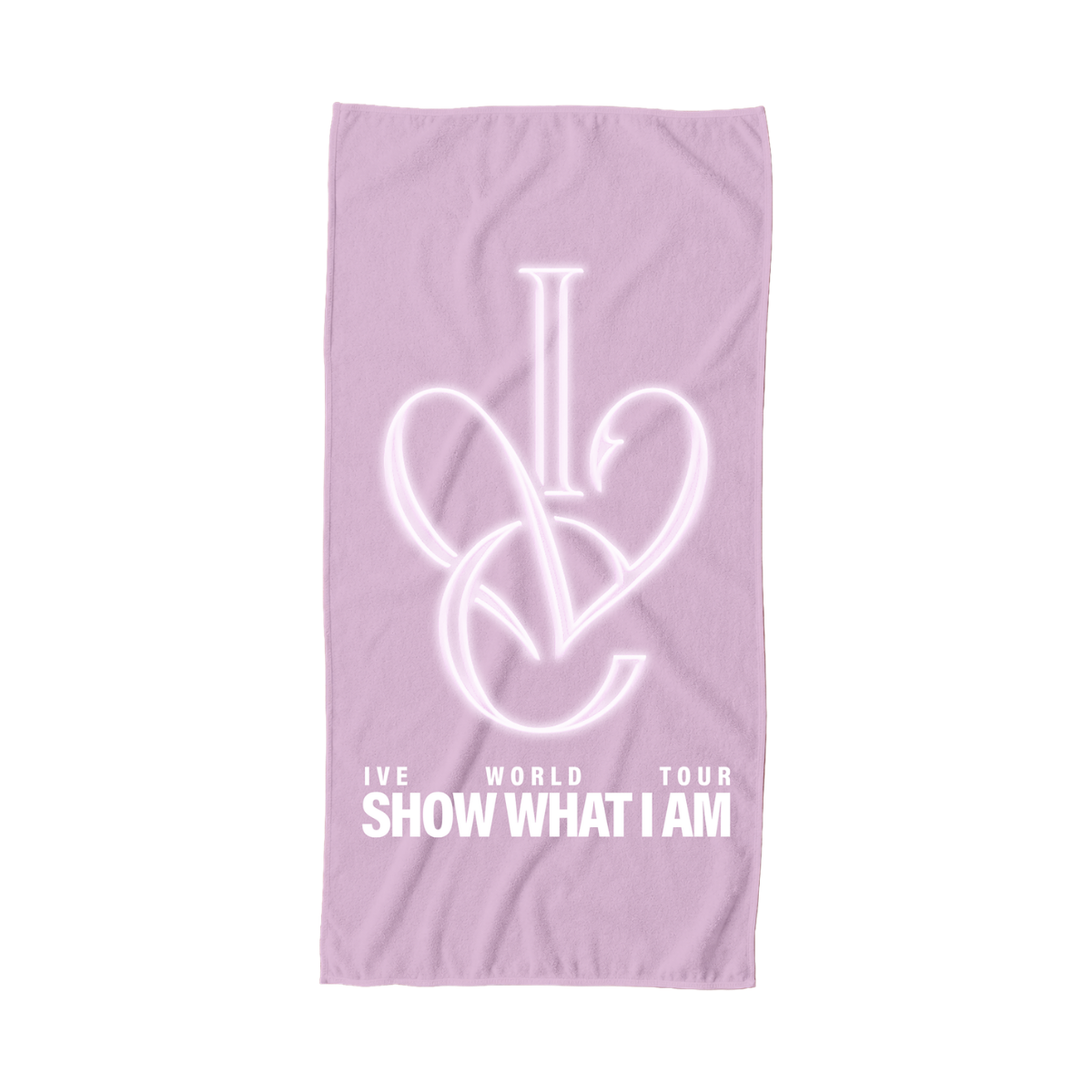 A light pink beach towel featuring a white interlocking graphic of the letters 'IVE' forming a heart, with the text 'IVE WORLD TOUR SHOW WHAT I AM' printed below in white.